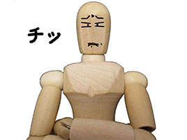舌打ちをする人形